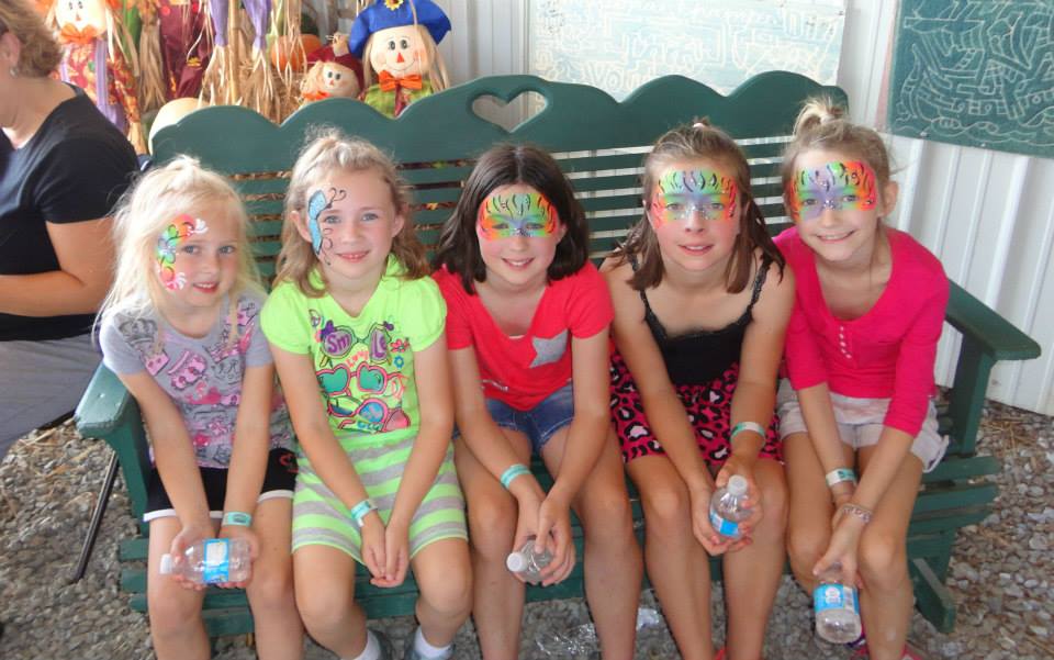 Kids face painting at Maple Farms