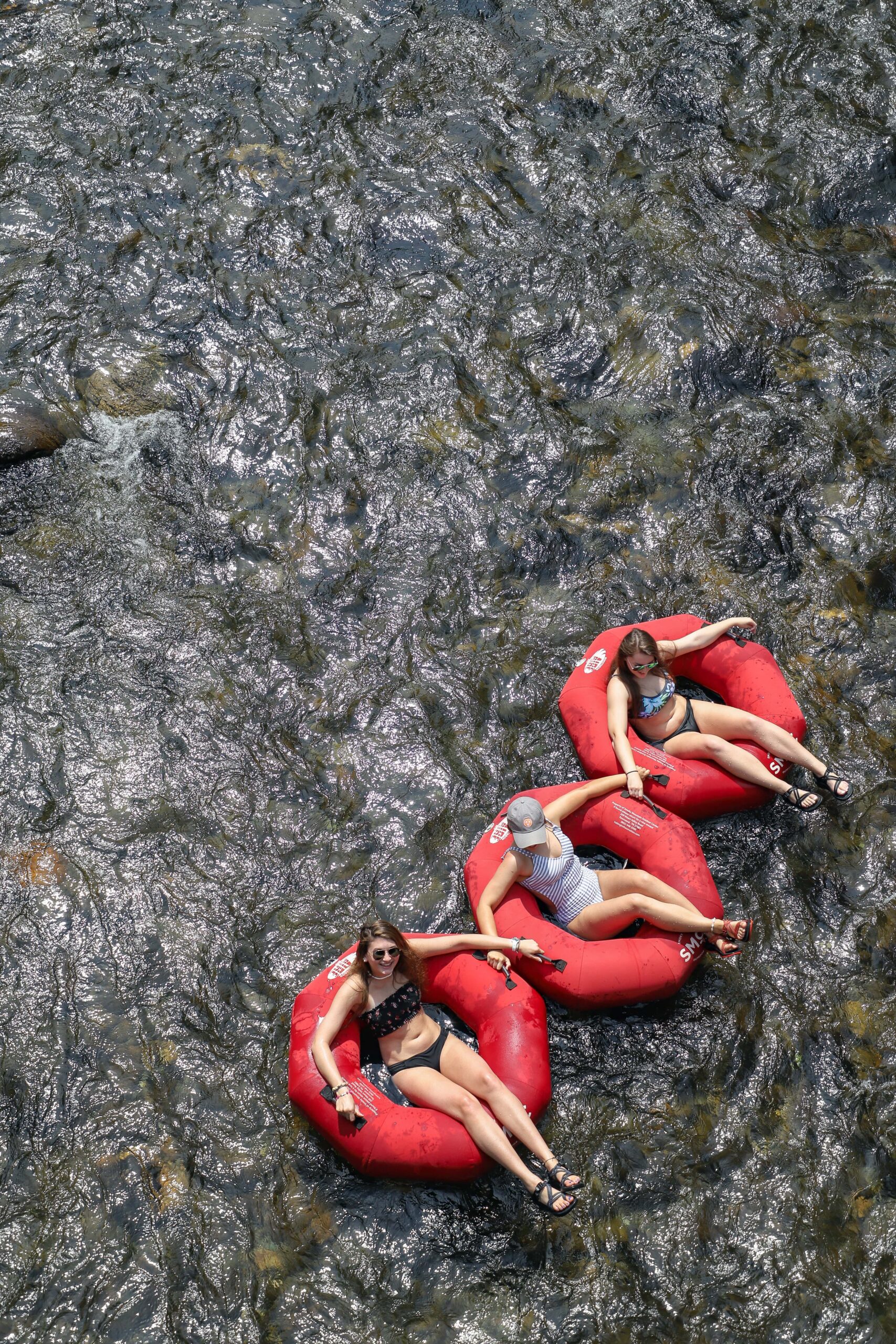 friends tubing down the Little River in Townsend, TN